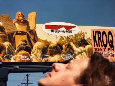 Vandalized KROQ billboard, Jed in foreground 